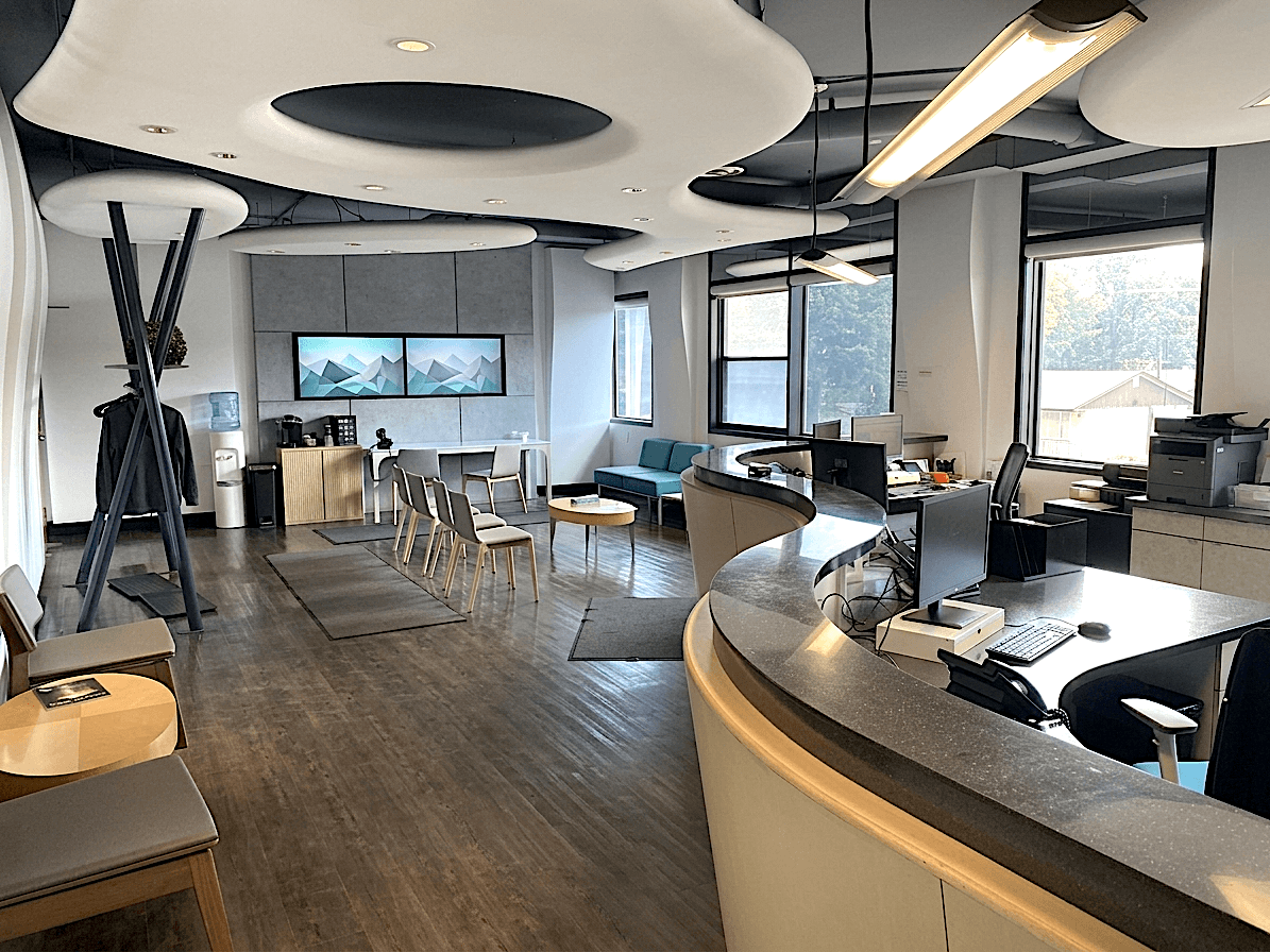 The patient waiting area and reception desk at Embrace Orthodontics Manitoba